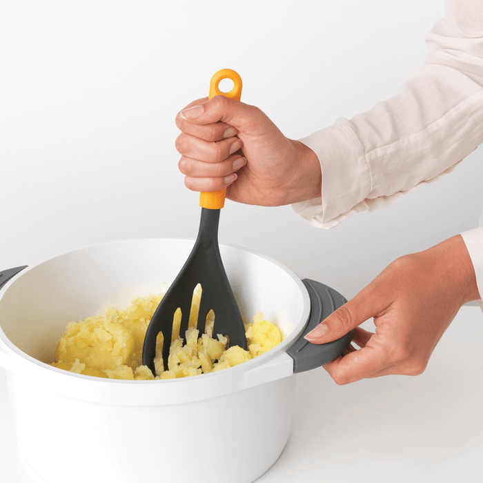 Brabantia Tasty+ Potato Masher plus Spoon - Honey Yellow - Gourmet Gear